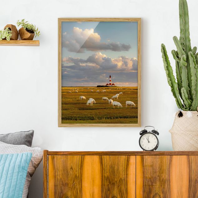 Quadros com moldura praia North Sea Lighthouse With Flock Of Sheep