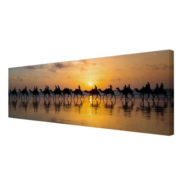 Quadros em laranja Camels in the sunset