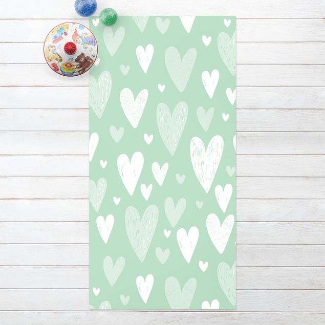 tapete exterior jardim Small And Big Drawn White Hearts On Green